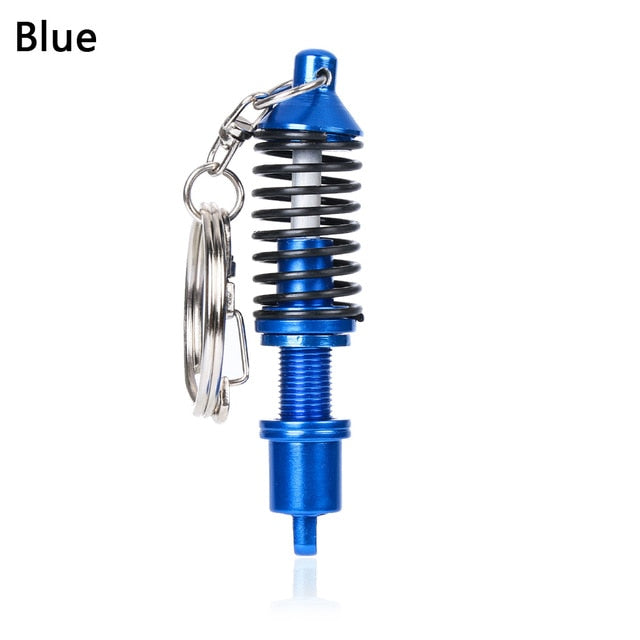 Adjustable shock absorber keychain