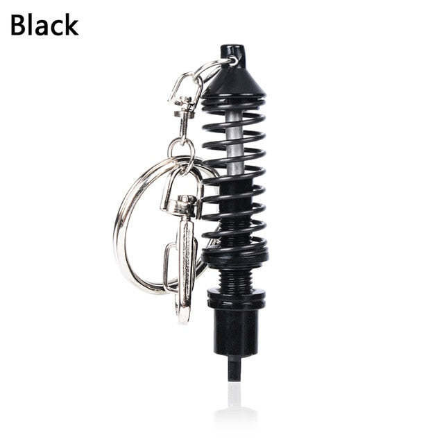 Adjustable shock absorber keychain