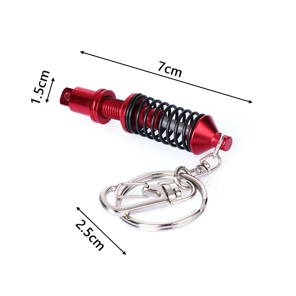 Adjustable shock absorber keychain