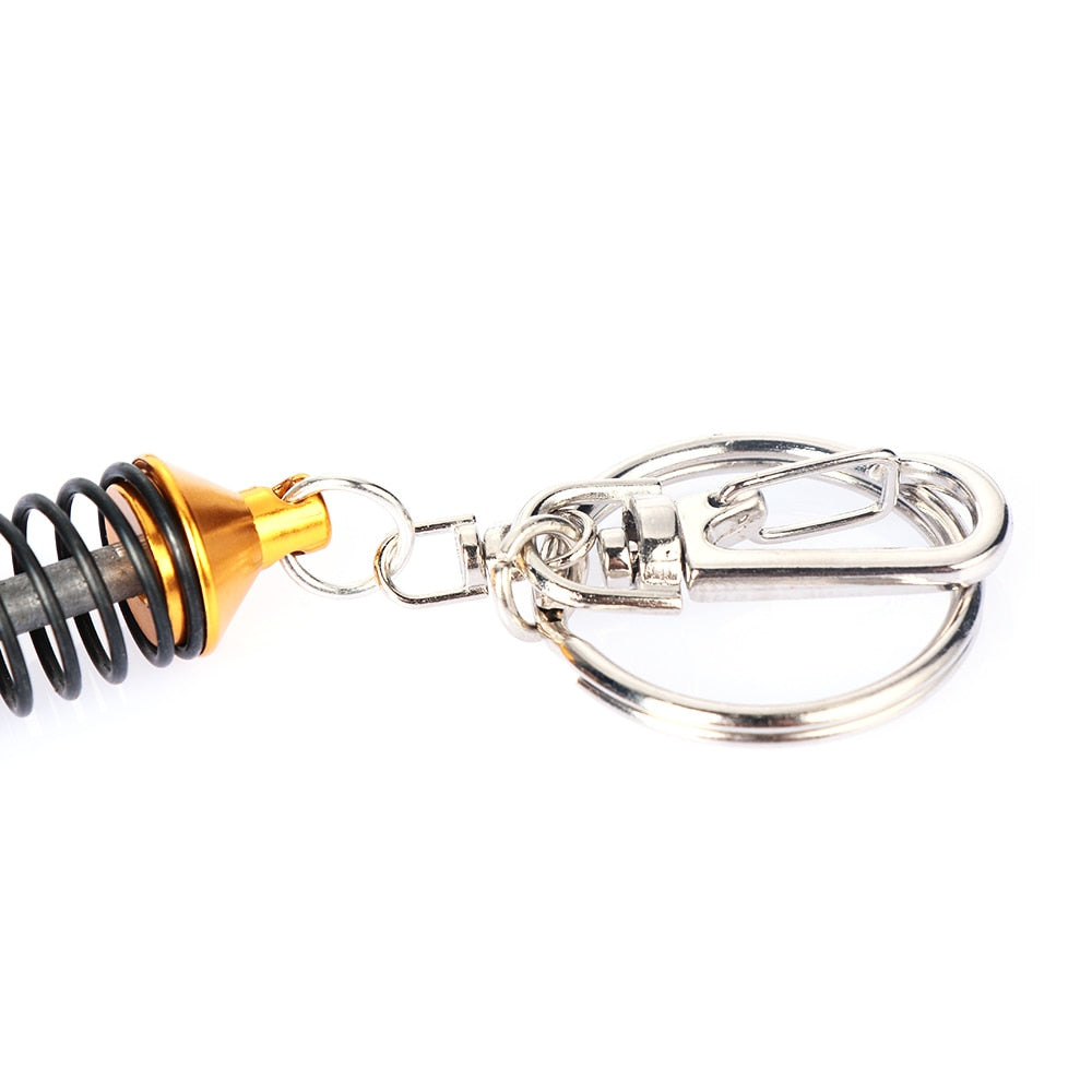 Adjustable shock absorber keychain